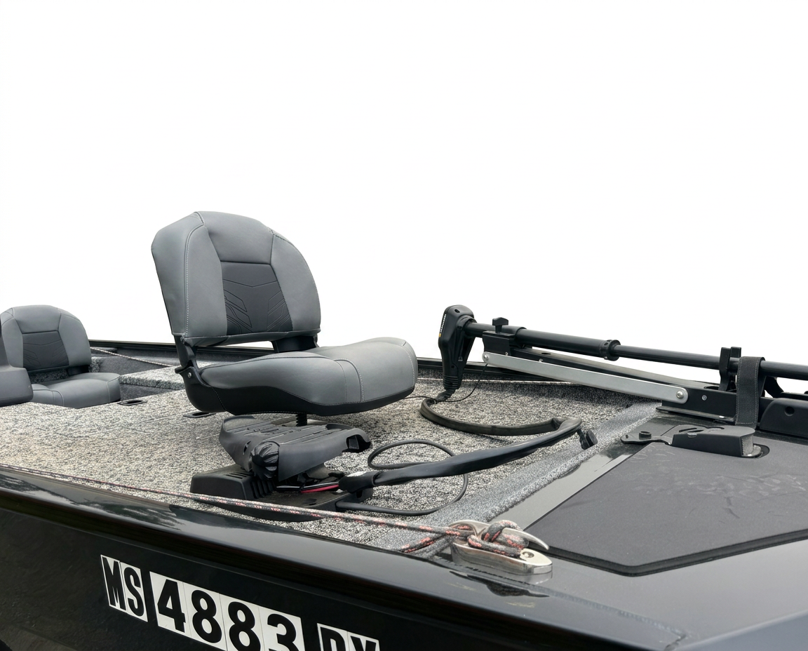 Close-up of the bow fishing deck with pedestal seat, trolling motor, foot control, wiring, and storage hatch.
